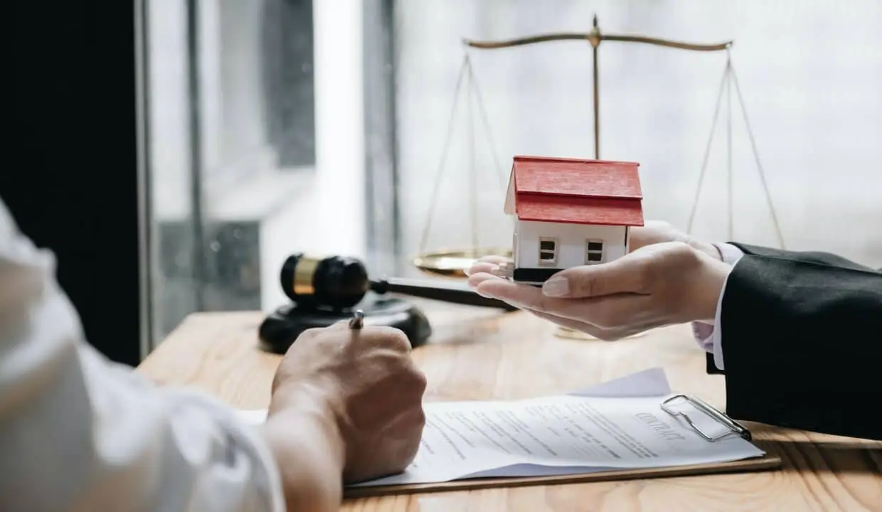 Real estate agent talked about the terms of the home purchase agreement and asked the customer to